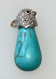 Turquoise Necklace with Silver Bird Bail