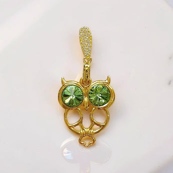 Gold Owl Pendant with Peridot Eye