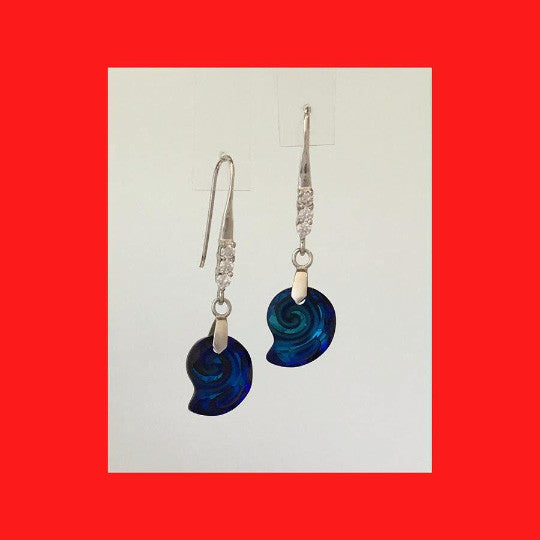 A pair of Swarovski Bermuda Blue 'Sea Snail' crystal pendant on sterling silver drop earrings, with cubic zirconia detailing.
