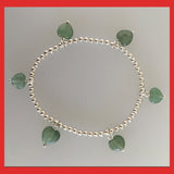 Bracelets; Elastic silver balls and heart dangles