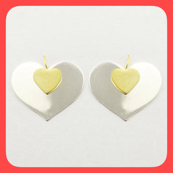 Earrings; Sterling silver with gold plated heart shape drop