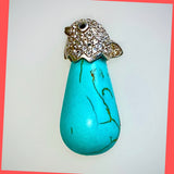 Turquoise Necklace with Silver Bird Bail