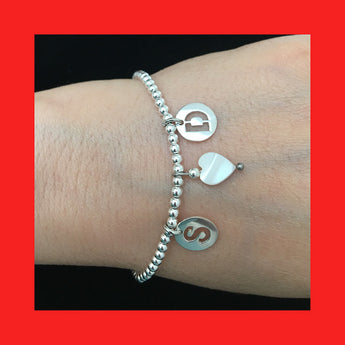 Bracelets; Letters on Balls Band