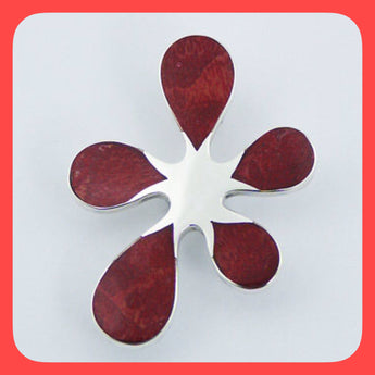 Pendants; Sterling silver and sponge Coral in a flower shaped