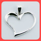 Pendants; Sterling silver asymmetrical open floating heart